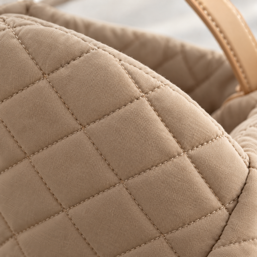 Close-up of the diamond quilting and stitching